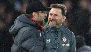 Jürgen Klopp (l.) bremst beim FC Liverpool die Euphorie.